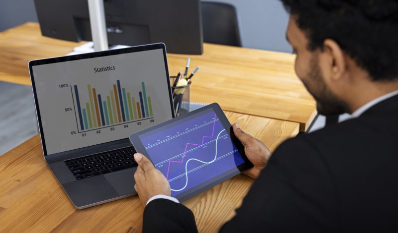 business-person-looking-finance-graphs (1)