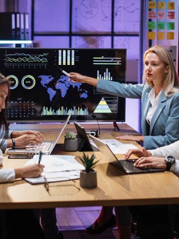 multiracial-partners-discussing-financial-project-2024-12-13-05-56-26-utc