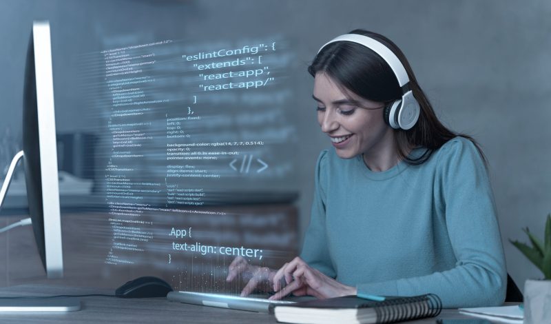 programming-background-with-person-working-with-codes-computer