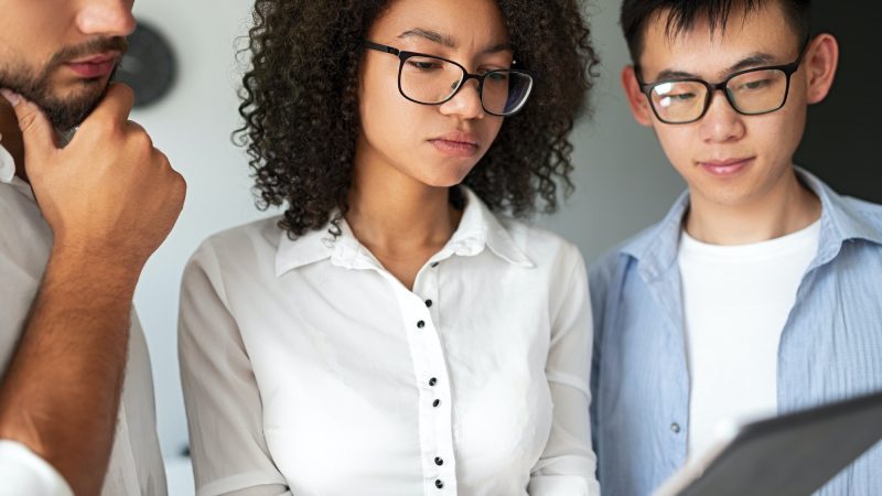 serious-diverse-programmers-using-tablet-r3uu9przcctwtyt1gm6pku3saqzdv8x26ctswk48t0