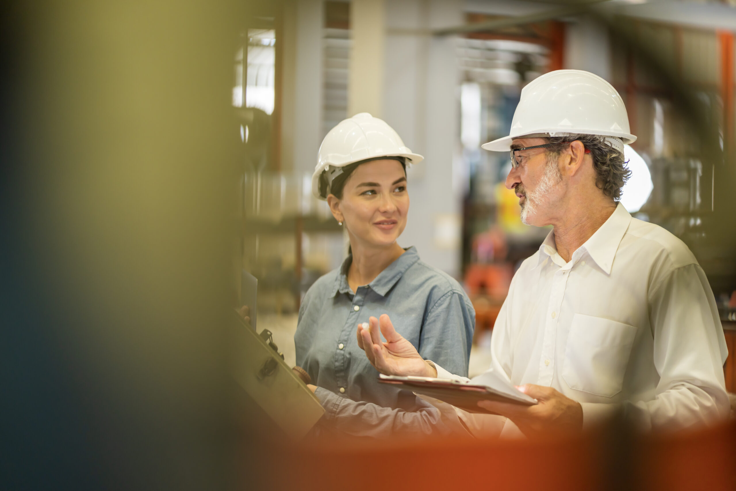 A new generation of engineers in a metal sheet factory. Studying work methods from supervisors or colleagues and studying by yourself be taught professionally