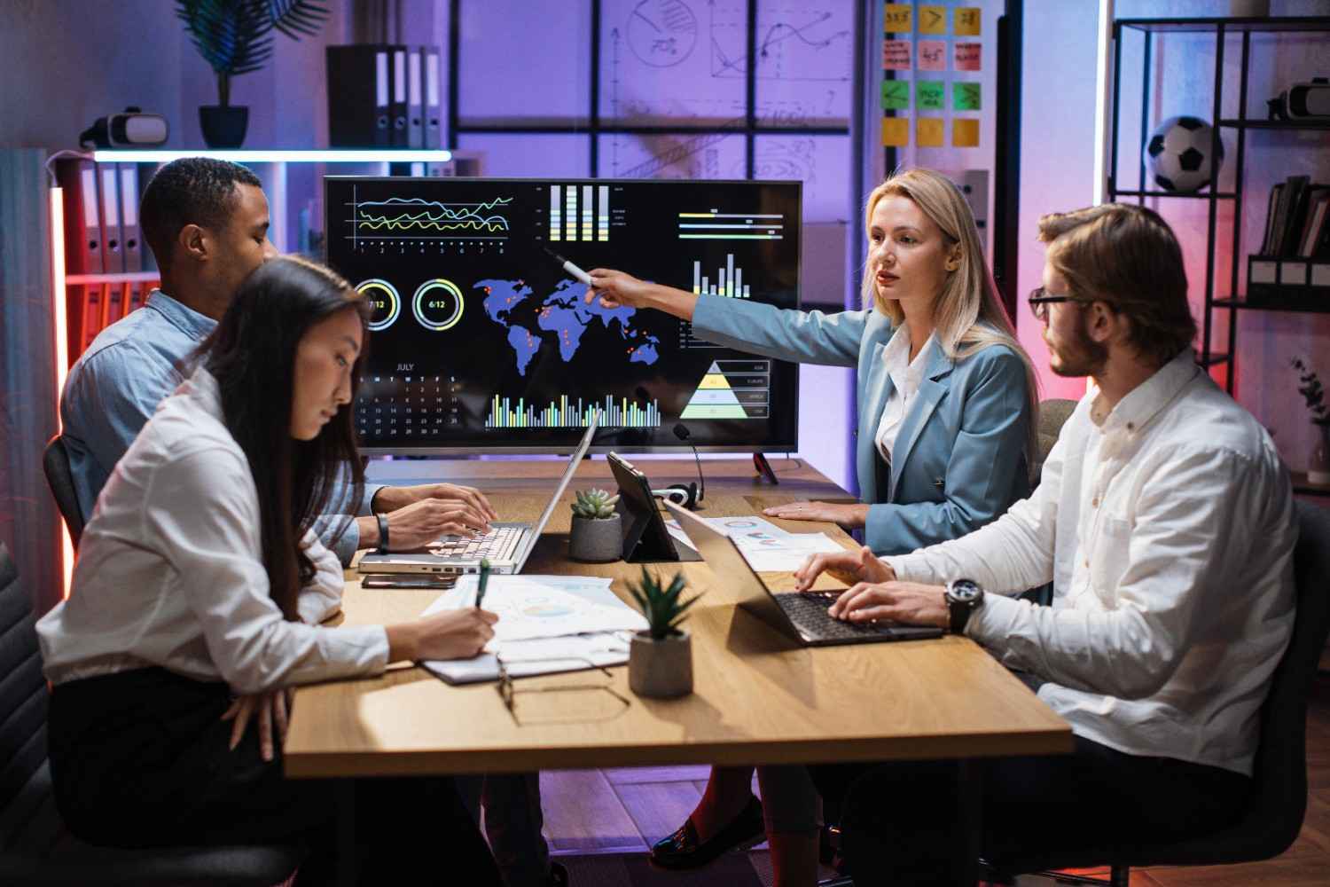 multiracial-partners-discussing-financial-project-2024-12-13-05-56-26-utc multiracial-partners-discussing-financial-project-2024-12-13-05-56-26-utc